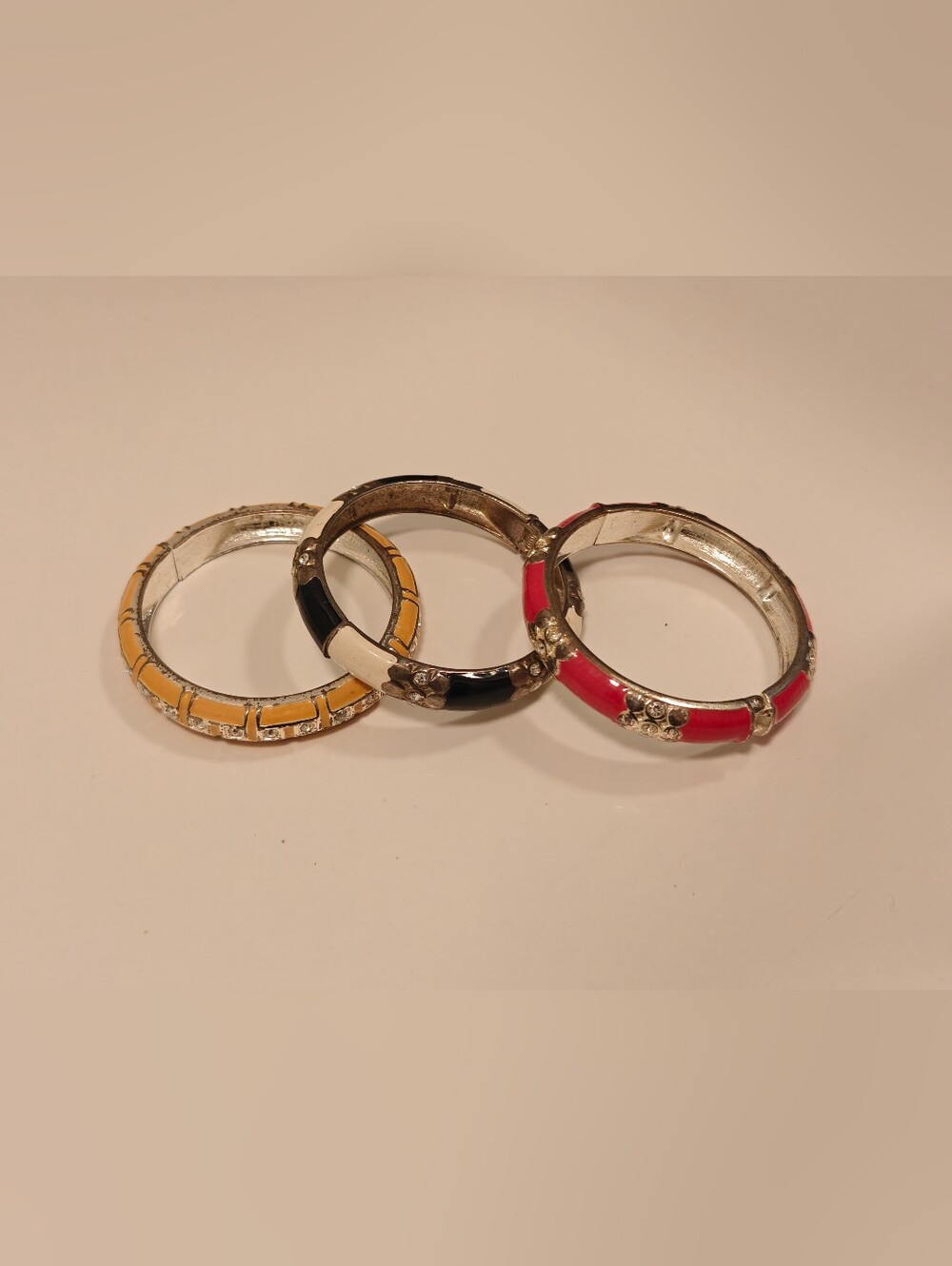 Set of Three Enamel Fashion Bangle Bracelets - Yellow, Black & Red